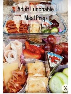 two plastic containers filled with food on top of a counter