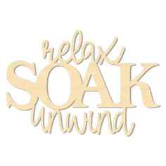 the word relax soak unwind in wood cutout on a white background with an inscription