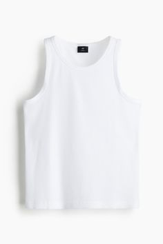 Slim-fit tank top in medium weight  ribbed cotton-blend jersey with a fitted silhouette. Straight-cut hem. Classic Ribbed Tank Top For Spring, White Ribbed Casual Tank Top, Casual White Ribbed Tank Top, White Ribbed Tank Top, Casual Style, Basic Summer Tops With Ribbing, Basic Ribbed Summer Tops, Basic Ribbed Tops For Summer, Classic Sleeveless Ribbed Top, Casual Crew Neck Tank Top With Ribbing