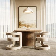 a dining room table with four chairs and a painting on the wall above it in front of curtains