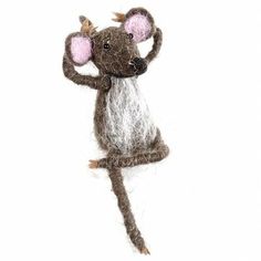 a needled mouse is holding its head in the air