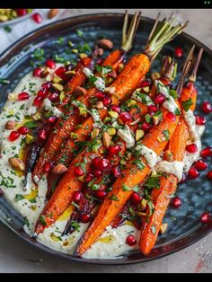 carrots and pomegranate on top of mashed potatoes with yogurt