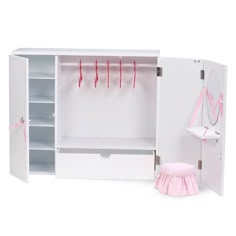 a white wardrobe with pink clothes hanging on the door and two drawers, one open