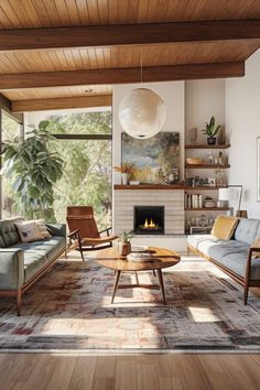 a living room filled with furniture and a fire place in the middle of a room