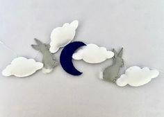 the moon and clouds are made from felt