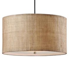 a beige drum light hanging from a ceiling fixture