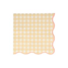 a pink and white checkered napkin with scalloped edges