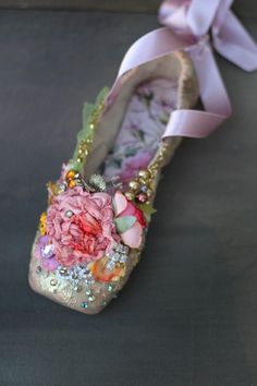 Ornate home decor piece, fairytale baroque ballerina shoe. Inspiration came one of my digital collages where i combined florals over museum canvas shoe photo and got the vision to embellish physical shoe with same rich color and details, musing the baroque era fashion. The shoe has been covered with vintage and antique ornate lace pieces (mainly tambour lace) then painted with chalk paints in cream and gold, varnished, and embellished with silk blossoms, handmade silk sculpted cabbage rose, crystals and beads. The inner sole is covered with printed vintage ephemera detail. The outer sole is painted pale gold. Comes carefully packaged in cardboard box and bubble wrap. NB! This decorative piece is not a toy and not intended for children to play. Contains small details. measurements length 20 Decorated Ballet Shoes, Shoe Embellishments Diy, Ballet Shoes Art, Tambour Lace, Upcycle Shoes, Shoe Photo, Baroque Era, Fairy Shoes, Digital Collages