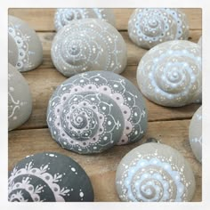 there are many painted rocks that look like flowers