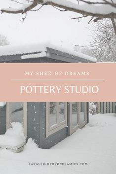 a house covered in snow with the words, my shed of dreams pottery studio