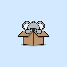 a koala sitting in a cardboard box with its eyes closed and head inside it