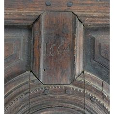 an old wooden door with the word c & 4 on it's front panel