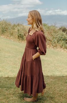 The Odessa dress is a flawless blend of charm, romance, and femininity. Featuring a smocked bust that will stretch and fit you so effortlessly and a subtle ruffle that follows the bust through the shoulders. This dress also features pockets.  XS: 43” length / 23” Bust / 21” Waist S:  43.5” length / 25” Bust / 23” Waist Long Fall Dresses Casual, Prairie Outfit Style, Long Skirts For Short Women, Neuflora Outfits, Homemaker Dresses, Mikaela Aesthetic, Feminine Dresses Casual, Neuflora Dresses, Smocked Dress Outfit