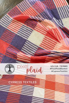 a close up of a plaid fabric with the words pixel plaid on it