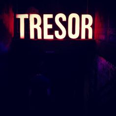 a neon sign that reads tresor in the dark