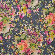 an image of a flowery fabric with many flowers on it's blue background