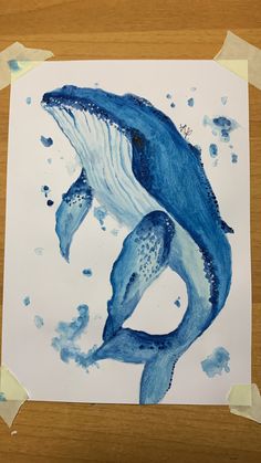 a drawing of a blue whale with its mouth open