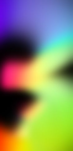 an abstract blurry background with colors that appear to be multi - colored and black