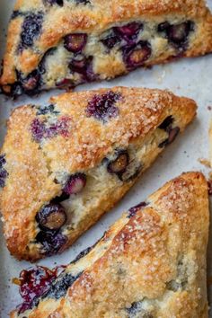 blueberry turnover pies on a baking sheet