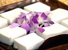 some white cubes with purple flowers on them