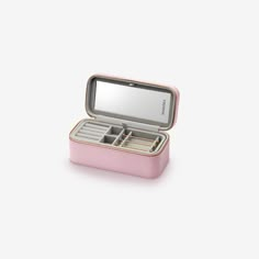 a pink case with compartments for small items