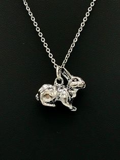 "This beautiful rabbit charm necklace can be worn in either silver or gold and is made from metal alloy resting about 9.5\" from the neck, perfect for any outfit!" Animal Pendant Necklace, Rabbit Ring Jewelry, Hare Necklace, Bunny Pendant Necklace, Rabbit Necklace Pendants, Beautiful Rabbit, Rabbit Charm, Island Lake, Moon Charm