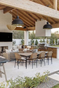 an outdoor kitchen and dining area is shown in this image with the words tiktok above it