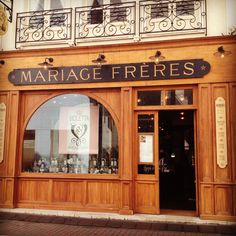 a store front with the words marriage freress written on it