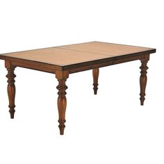 a wooden table sitting on top of a white floor