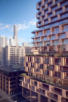 an apartment building with balconies in the city