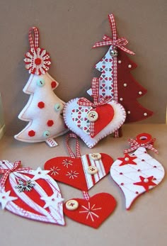 christmas ornaments are arranged on a table