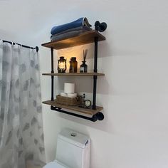 the bathroom is clean and ready to be used as a shower curtain rod or shelf