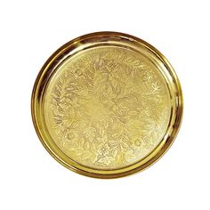 a gold plate with an intricate design on the bottom and sides, isolated against a white background