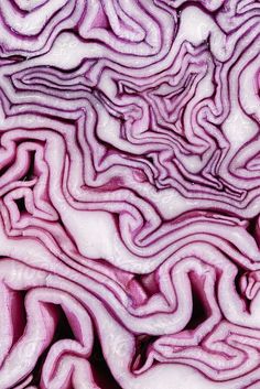 an image of red cabbage that is cut in half