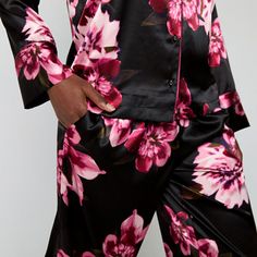 You'll feel glamorous slipping into this Ambrielle women's floral-print satin pajama set at the end of the day. This set includes a button-down shirt with a notch collar, plus a pair of matching pants with an elastic-waist and side slip pockets. # Pieces In Set: 21st Piece Description: Top1st Piece Collar: Notch Collar1st Piece Apparel Length: 26 Inches1st Piece Fabric: Satin1st Piece Fiber Content: 97% Polyester, 3% Spandex1st Piece Care: Tumble Dry, Machine Wash2nd Piece Description: Pants2nd… Satin Pajama Set, Satin Pajama, Satin Long Sleeve, Satin Pyjama Set, Satin Pajamas, Matching Pants, Notch Collar, Pajama Sets, New Orleans