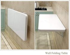 the wall folding table is next to a kitchen sink