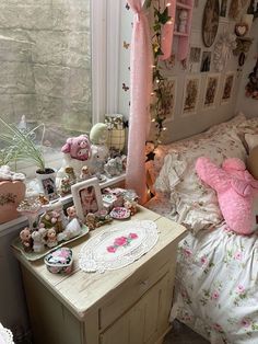 a room filled with lots of stuffed animals and toys on top of a wooden table