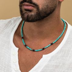 Looking for a gift for your man? You've found the perfect item for this!  This unique turquoise beaded necklace for men is the perfect accessory to add a touch of style to any outfit. Handcrafted with high-quality turquoise beads, this necklace is set with 5 striking black onyx beads for a bold and sophisticated look. Whether you're dressing up for a special occasion or looking to elevate your everyday style, this statement piece is sure to make a statement. Add this stunning necklace to your co Men Necklaces, Mens Beaded Necklaces, Mens Jewellery, S Jewelry, Estilo Boho Chic, Turquoise Bead Necklaces, Mens Jewelry Necklace, Stone Beaded Necklace, Onyx Necklace