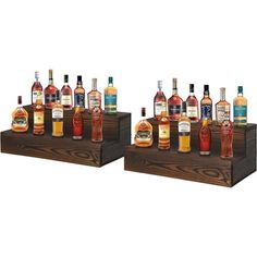 two wooden stands holding several bottles of liquor