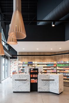 the interior of a grocery store with marble counter tops