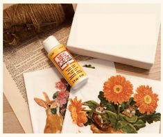 an image of crafting supplies on a table with flowers and other things to make it look like they have been made out of paper