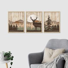 two deer paintings hanging on the wall next to a chair