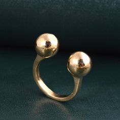 "Double Globe Ring, Protection  Open Ring, Geometric Ring, Sphere Ring, Globe Ring, Designer Ring, Open ball ring, Gift for Him, Metal Ball. ❥ The brass metal will develop a nice antique color over time. So, I suggest cleaning it once in a while for getting back to the shiny original color. You can use natural ingredients like lemon or vinegar with water to clean it. Also, apply a thin coat of transparent nail paint/nail enamel on the ring's inner side to save it from being tarnished. All our products are Nickel and Lead-free & tarnish-resistant. ❥ Etsy is an artist-based community and it is a poor ETSY manners to leave a negative review before communicating with your seller. Please contact me prior to leaving any unsatisfied feedback. ❥ Since international mail is affected by several circ Sphere Ring, Ring Geometric, Open Cuff Ring, Paint Nail, Unique Gold Rings, Simple Rings, Transparent Nails, Cuff Ring, Jewelry Minimalist