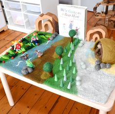 a child's play table with a book on it