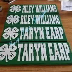 four st patrick's day signs on a table