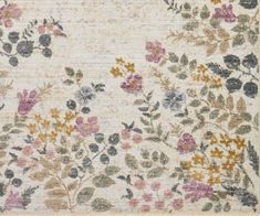 an area rug with flowers and leaves on it