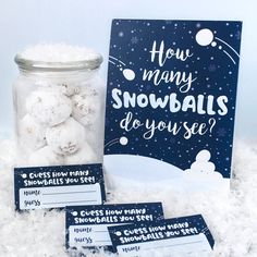 snowballs in a glass jar next to a greeting card and two cards with instructions for how many snowballs do you see?