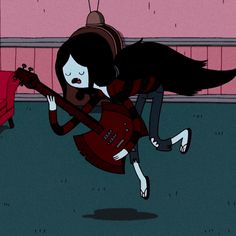 a girl with long black hair is playing the guitar