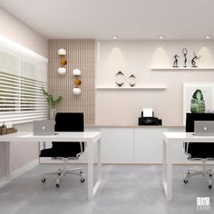 an office with two white desks and black chairs