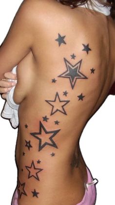 a woman's back with stars on it